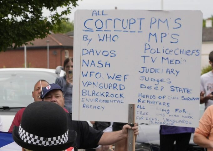 File photo dated 4/8/2024 of Peter Lynch holding a sign outside the Holiday Inn Express, at Manvers, Rotherham, during a disturbance outside a hotel housing asylum seekers. The 61-year-old grandfather who was jailed for more than two years after he was filmed screaming abuse at police during the riot has died in prison. The Ministry of Justice confirmed that Lynch, died at HMP Moorland, near Doncaster, on Saturday. Issue date: Monday October 21, 2024. PA Photo. See PA story PRISONS Southport. Photo credit should read: Danny Lawson/PA Wire