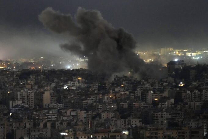 Smoke rises from an Israeli airstrike on Dahiyeh, in the southern suburb of Beirut, Lebanon, Sunday, Oct. 20, 2024. (AP Photo/Hussein Malla)