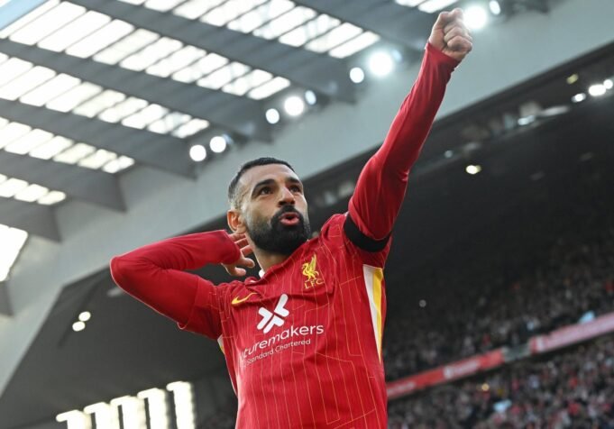 LIVERPOOL, ENGLAND - OCTOBER 20: (THE SUN OUT, THE SUN ON SUNDAY OUT) Mohamed Salah of Liverpool celebrating after scoring the opening goal during the Premier League match between Liverpool FC and Chelsea FC at Anfield on October 20, 2024 in Liverpool, England. (Photo by John Powell/Liverpool FC via Getty Images)